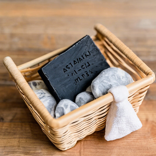 charcoal soap in basket with rocks