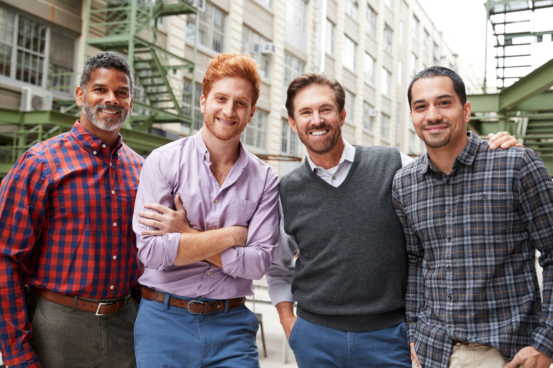 4 men with beard standing next to each other