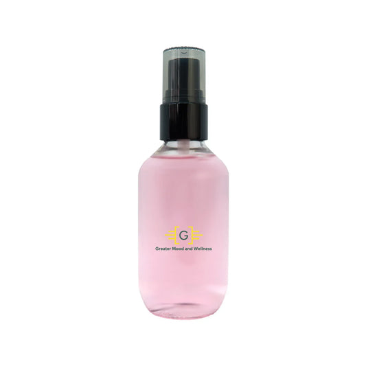 A small spray bottle with pink oil control setting spray 