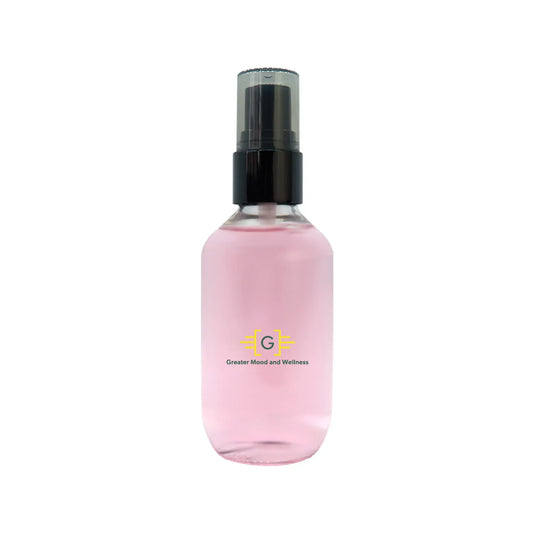 A small spray bottle with pink oil control setting spray