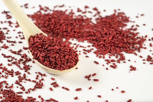 Picture of spoon displayed with Red Yeast Rice.