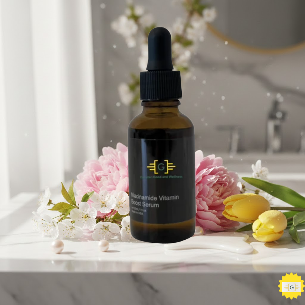 Greater Mood Vitamin C Radiance Serum on a marble countertop with spring flowers.