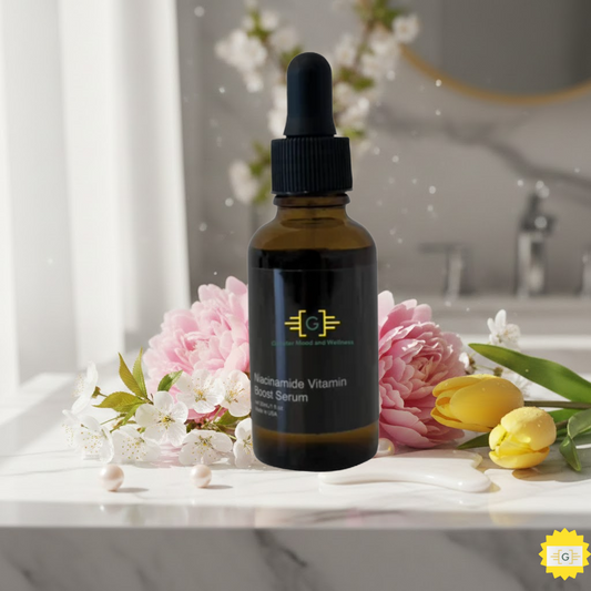 Greater Mood Vitamin C Radiance Serum on a marble countertop with spring flowers.