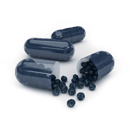 acai fruit capsules on a white back ground