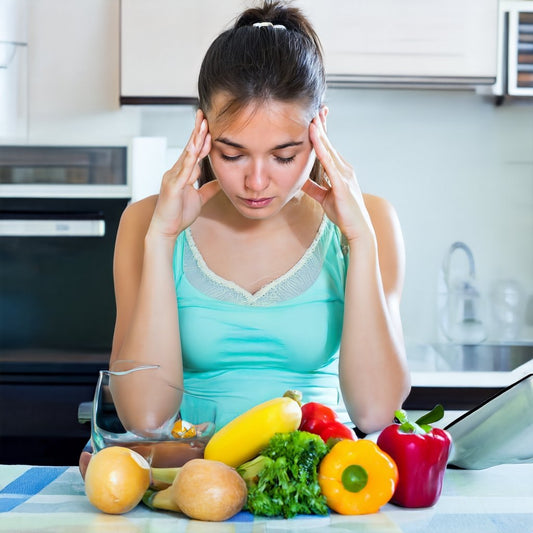 An assortment of healthy foods like fish, nuts, and leafy greens. Text: "Nutritious Diet for Lowering Blood Pressure