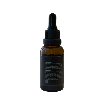 A white background showcases a bottle of Classic Beard Oil, an essential product for grooming and conditioning beards.