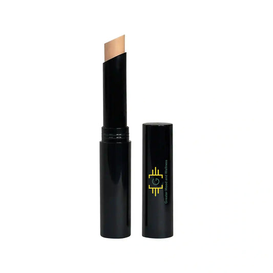 Conceal Stick: Black with gold logo. Creme Concealer Stick Beige.