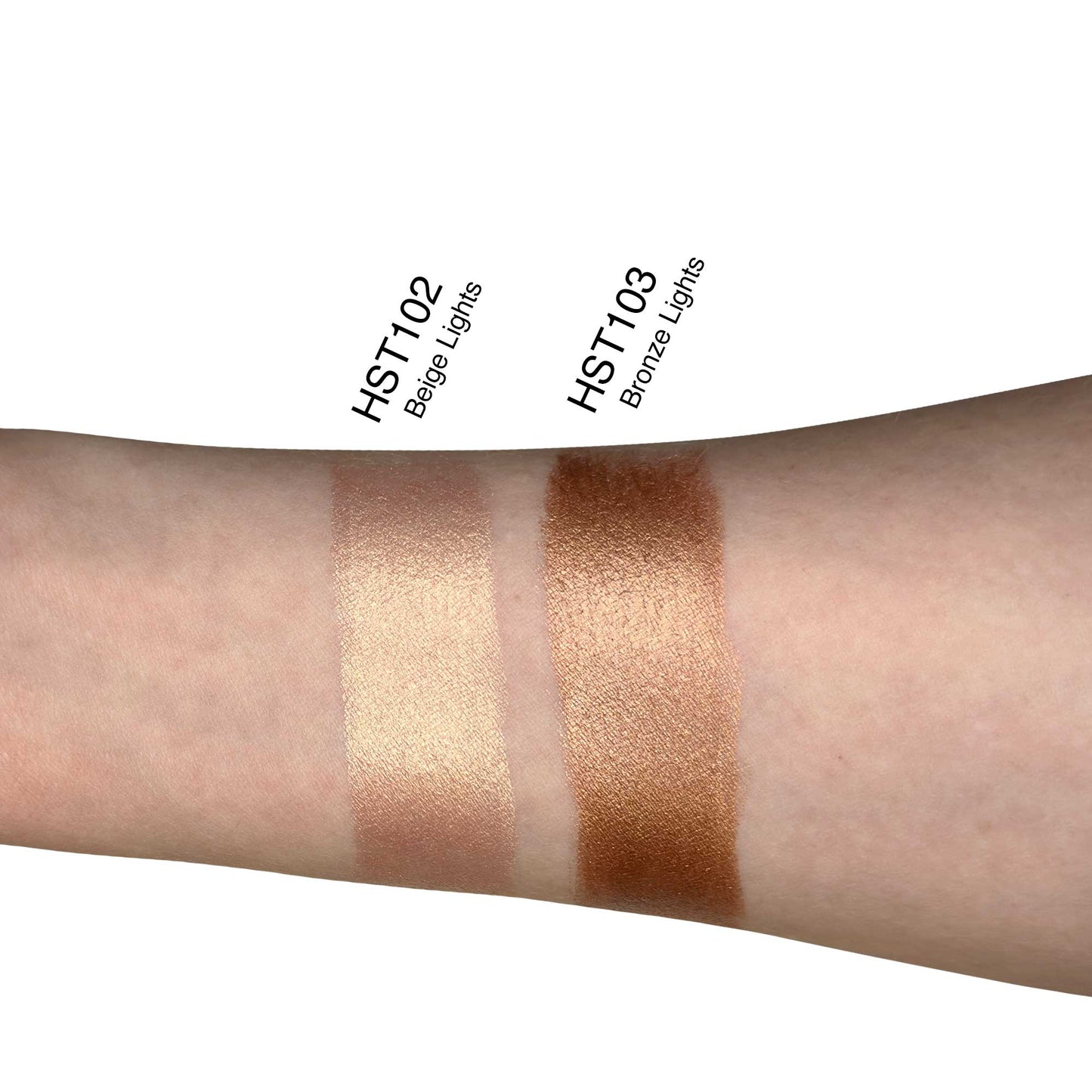 Arm showcasing three different bronze and gold makeup colors.